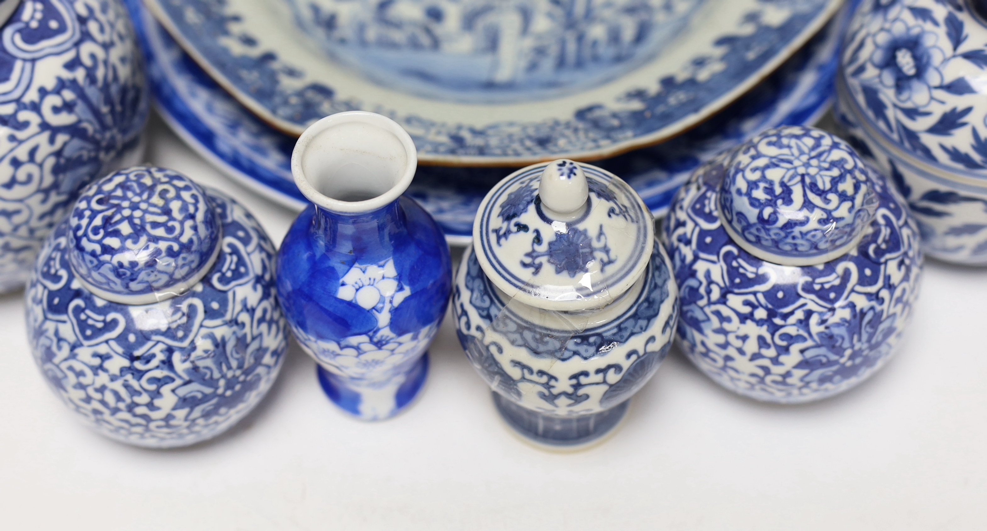 A group of Japanese and Chinese porcelain including an 18th century Chinese export dish, tallest 36cm